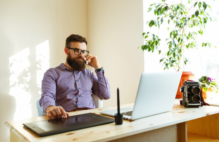Beard man working from home - modern business concept